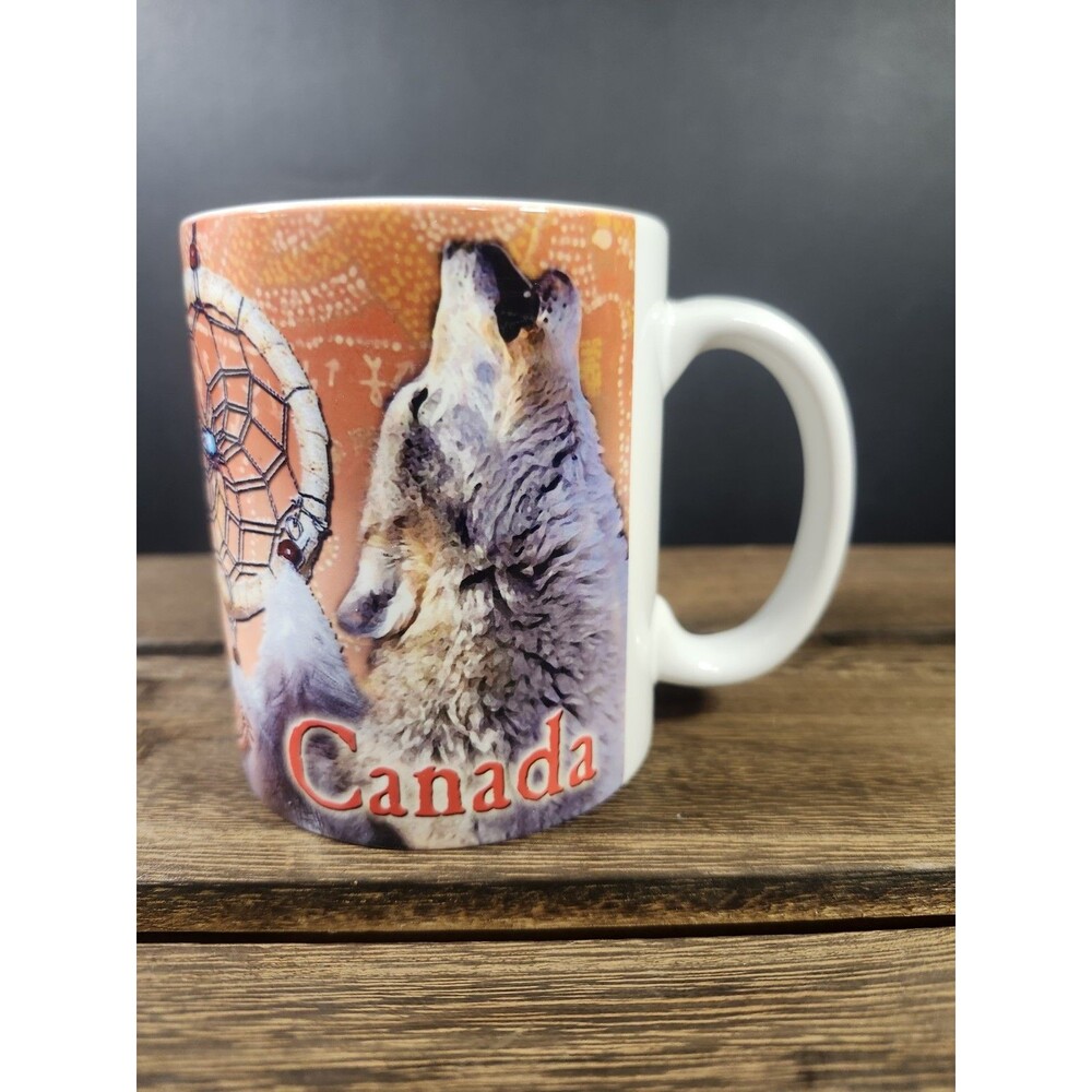 Canada Souvenir Mug Howling Wolf Indigenous Heritage Collage